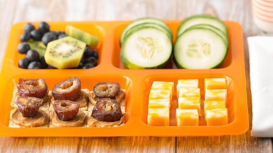 bento box with peanut butter and date cracker bites